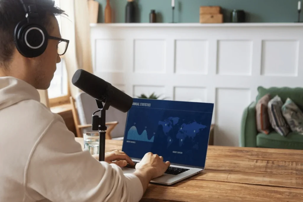 A person wearing a headset and microphone on the table.