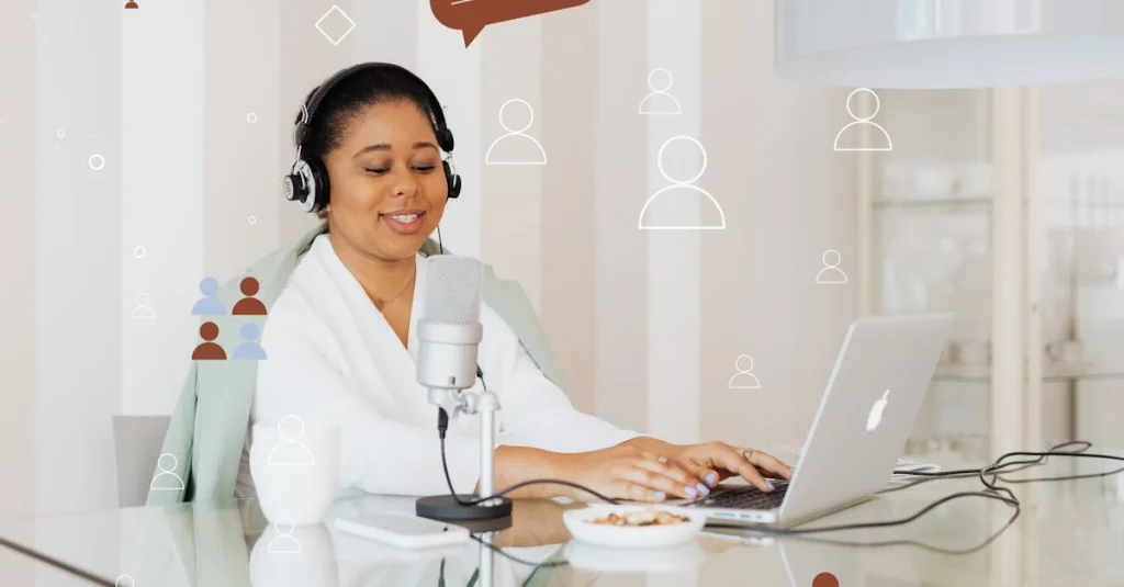 Woman with headphones recording B2B podcast at glass desk with laptop and microphone in bright office.
