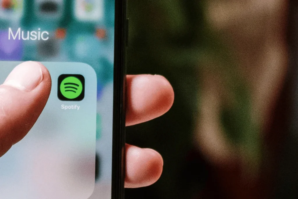 Close-up of the Spotify icon in a folder labeled "Music."